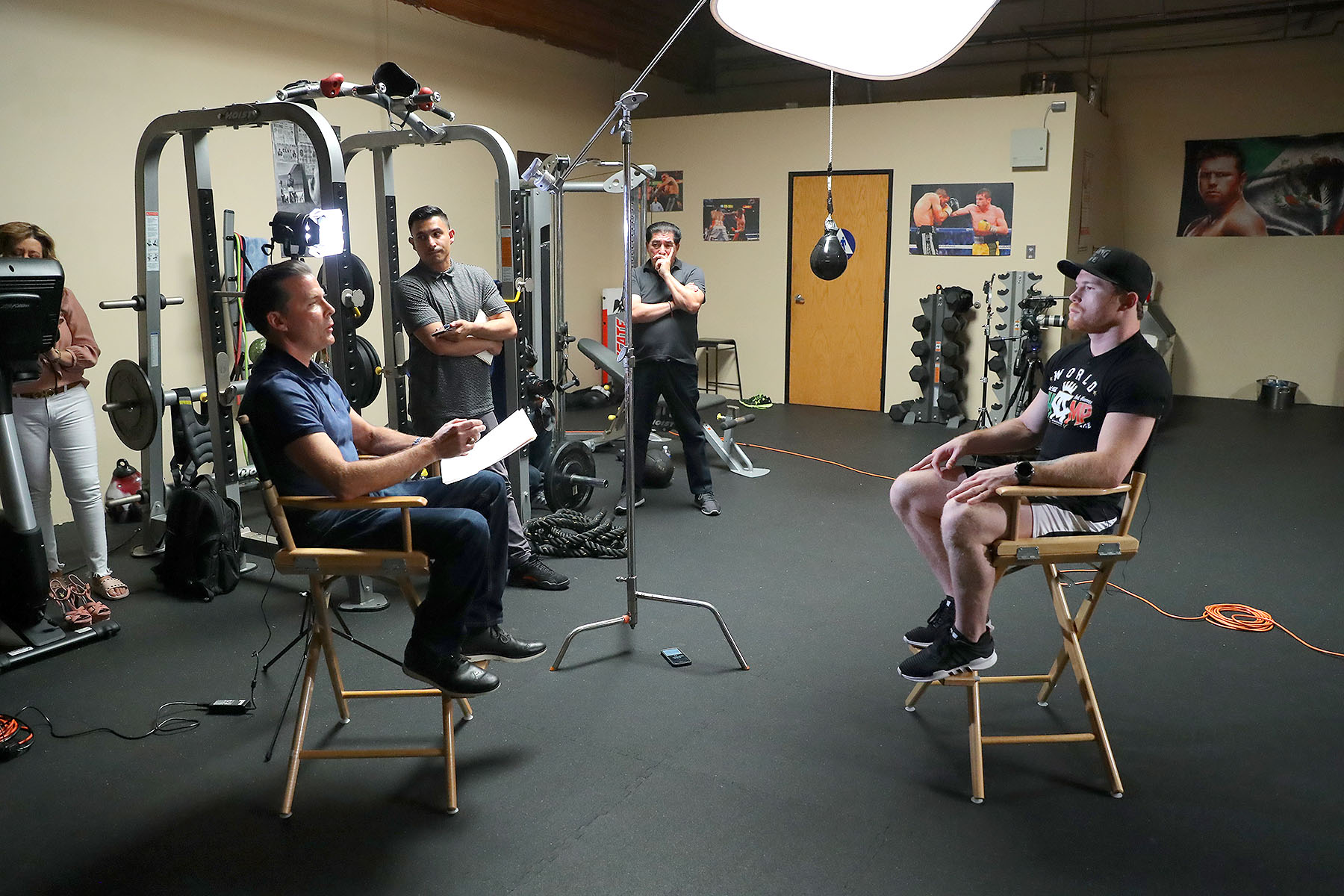 David Tetreault interviewing Canelo Alvarez on location in a boxing gym